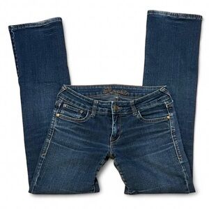 2000s low rise bootcut jeans with a dark wash